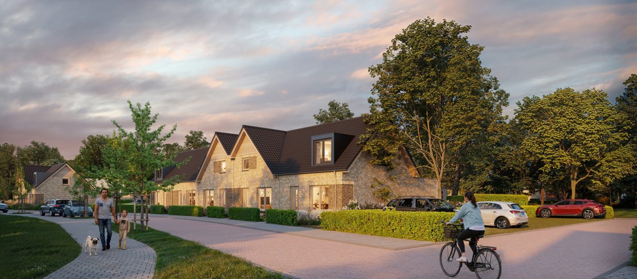 Nieuwbouwwoningen in ontwikkeling met fietsers langs woonstraat en groene erfafscheidingen in Heikant Gennep