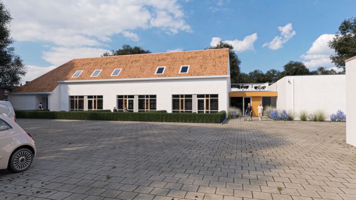 Impressie transformatie oude school Buchten: witte gevel, oranjerood pannendak, entree met luifel en plein