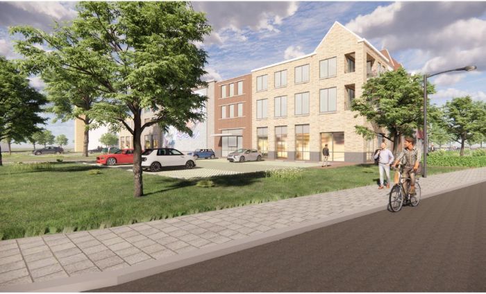 Impressie van nieuwbouw Martinushof in Tegelen met appartementen, groen, parkeerplaatsen en fietsers.