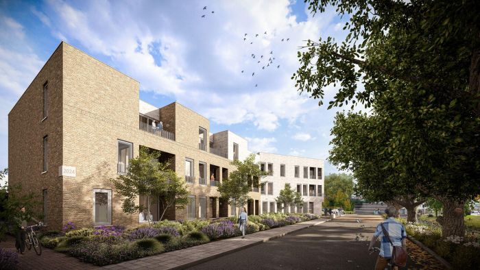 D’r Burggraaf Gulpen – architectuurimpressie van bakstenen woonblok met loggia’s en balkons, groene straat met bomen en voetgangers